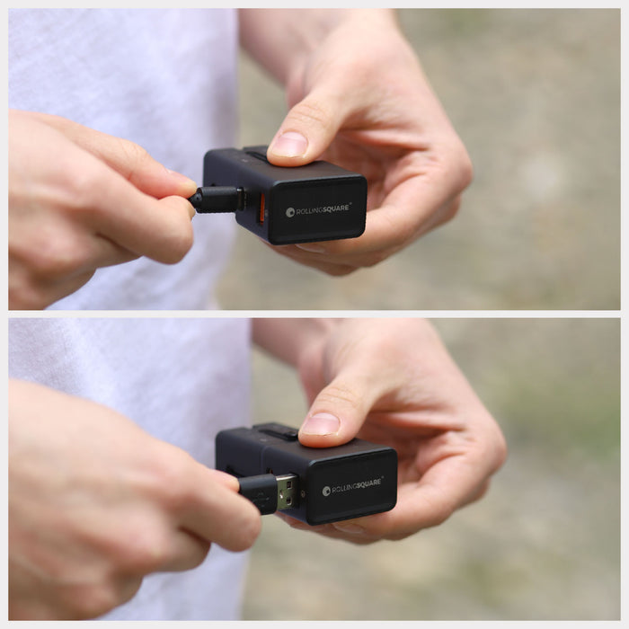 Pocket Travel Charger - US/EU/UK/AU plugs - Pocket Travel Charger - US/EU/UK/AU plugs - 30W - 1 Port - Compact black travel charger with interchangeable US/EU/UK/AU plugs held in hand. - Rolling Square Pocket Travel Charger - US/EU/UK/AU plugs - 30W - 1 Port - Compact black travel charger with interchangeable US/EU/UK/AU plugs held in hand. - Rolling Square