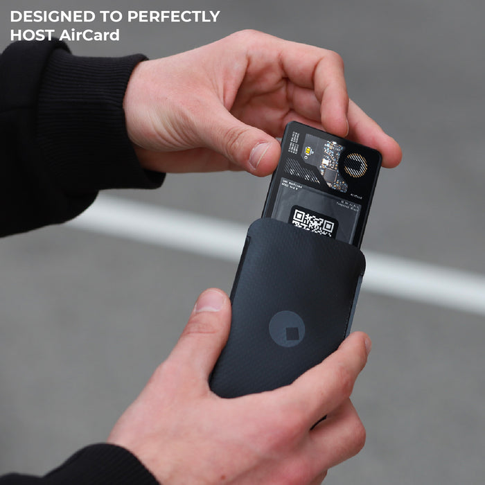 AirCard™ Pouch - Attach AirCard anywhere - AirCard™ Pouch - Attach AirCard anywhere - Black - Black slim pouch holding a small electronic AirCard with clear QR code and label. - Rolling Square AirCard™ Pouch - Attach AirCard anywhere - Black - Black slim pouch holding a small electronic AirCard with clear QR code and label. - Rolling Square