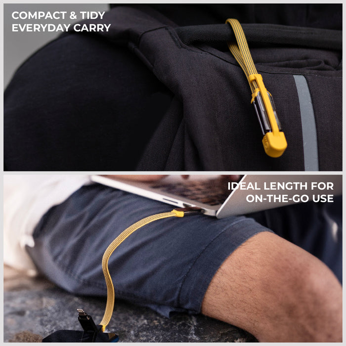 inCharge® XL 30cm / 1ft - 100W, 6in1 travel cable - inCharge® XL 30cm / 1ft - 100W, 6in1 travel cable - Urban Black - Yellow inCharge XL 30cm 6-in-1 travel charging cable attached to black backpack and coiled on leg. - Rolling Square inCharge® XL 30cm / 1ft - 100W, 6in1 travel cable - Urban Black - Yellow inCharge XL 30cm 6-in-1 travel charging cable attached to black backpack and coiled on leg. - Rolling Square