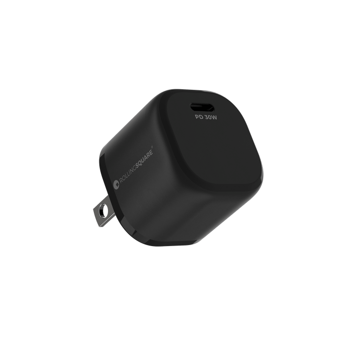 Essential GaN Charger - 30W power, 45% smaller - Essential GaN Charger - 30W power, 45% smaller - US - Compact black 30W GaN charger with foldable US plug and curved edges. - Rolling Square Essential GaN Charger - 30W power, 45% smaller - US - Compact black 30W GaN charger with foldable US plug and curved edges. - Rolling Square