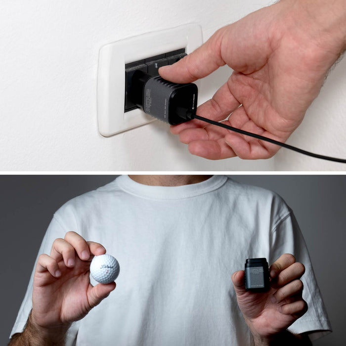 Supertiny 65W + Free 2in1 Cable (Bundle) - US - Compact black 65W USB charger with detachable cable held by a person in a white shirt, plugged into a wall outlet. - Rolling Square