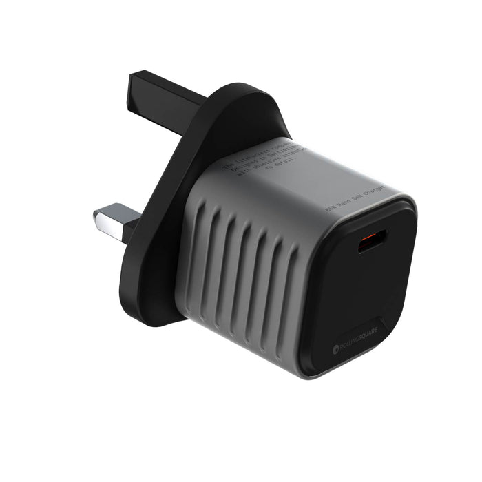 Supertiny - The smallest 65W GaN Charger ever - US - Compact black 65W GaN charger with UK three-pin plug and single USB-C port. - Rolling Square