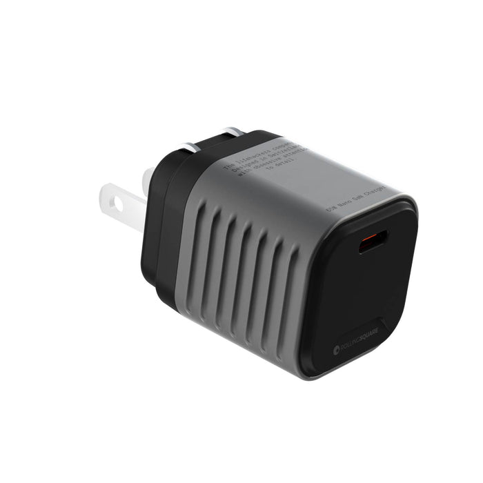 Supertiny - The smallest 65W GaN Charger ever - US - Compact gray and black 65W GaN charger with US foldable prongs and a single USB-C port. - Rolling Square